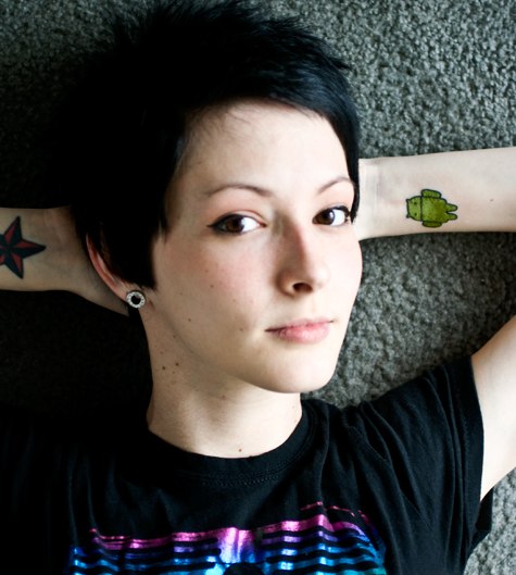 android tattoo Girl shows support for Android via logo tattoo
